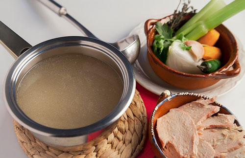 Pork Stock next to many vegetables