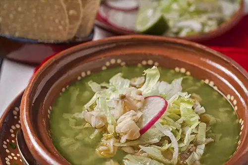 Green Pozole with Chicken accompanied with more ingredients